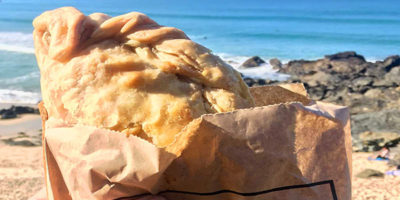 A st ives bakery pasty on Porthmeor beach
